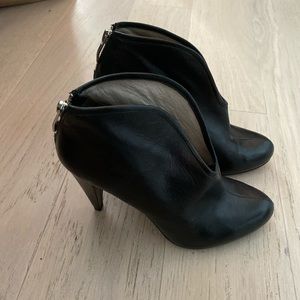 Lightly worn black Vince Camuto booties